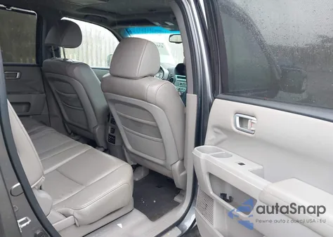 2011 Honda Pilot Touring z USA, uszkodzony, nr VIN 5FNYF4H92BB035672